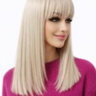 Długa peruka z grzywką  w kolorze platynowo/perłowy blond 16/18